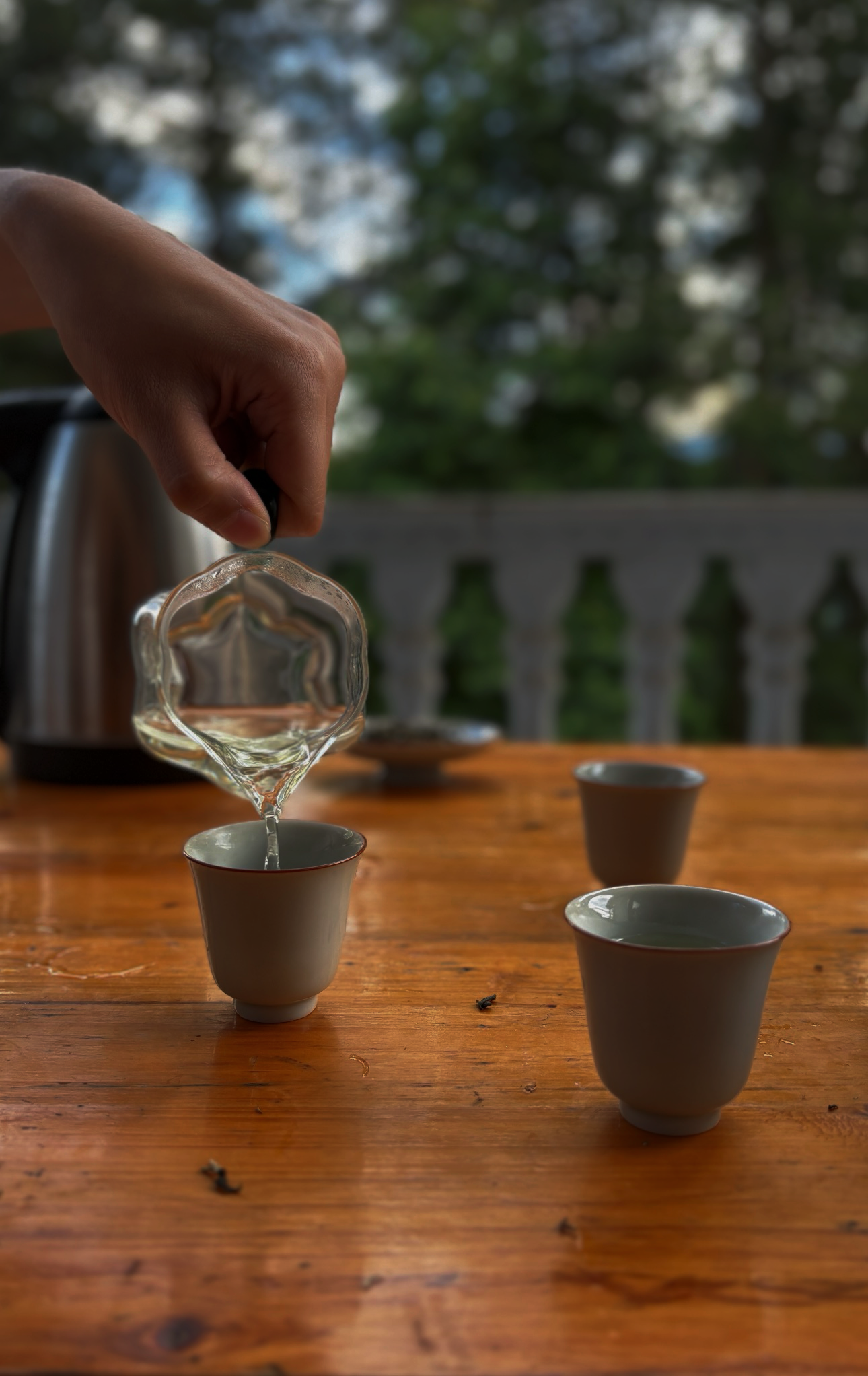 Pouring fresh Enshi Yulu on the porch