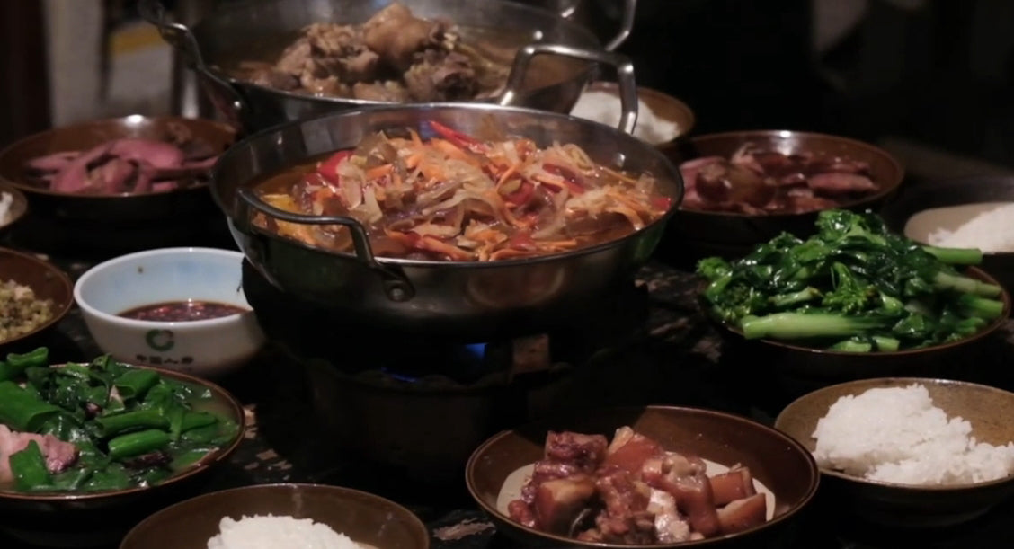 A Tujia home feast at the village table